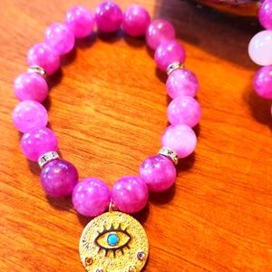 Pink tourmaline crystal evil eye bracelet 10mm